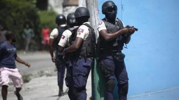 Haitian police officers standing on guard