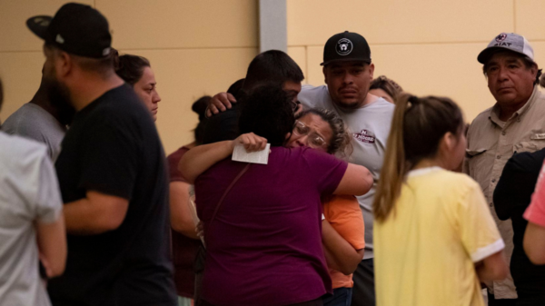 Women hug outside of the SSGT Willie