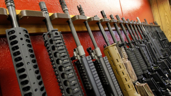 AR-15 style rifles are displayed for sale