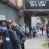 Voters walk out of the Kings Theatre