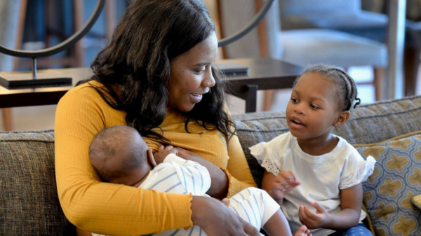 A Mother breastfeeding her five month old son