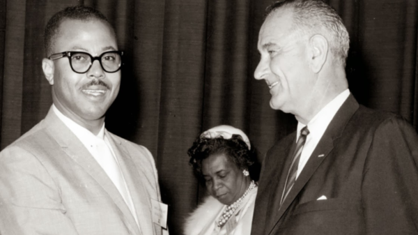 Rev. H. Rhett James greets Vice President Lyndon B. Johnson