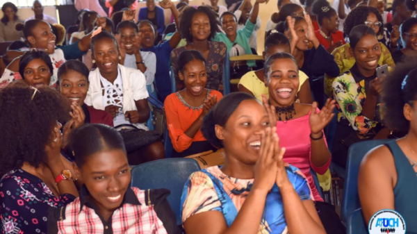 Attendees laugh during the Association of University Women