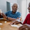 Senior couple playing dominoes