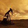 oil-pump-jack-sunset-clouds-silhouette