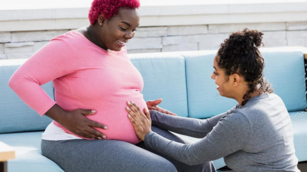 A PREGNANT AFRICAN-AMERICAN WOMAN