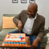 Glenn cutting cake 15th-birthday