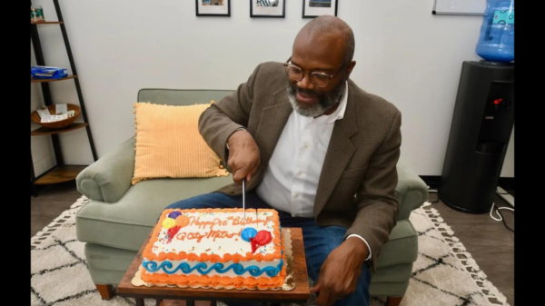 Glenn cutting cake 15th-birthday