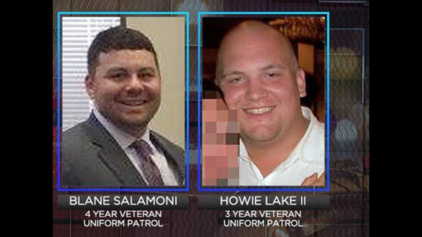 Officer Blaine Salamoni and Officer Howie Lake II