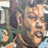 arah Mae Flemming mural on the side of a building in Columbia