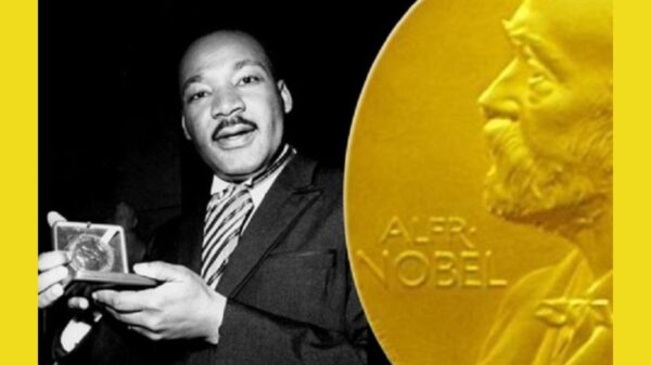 American Human Rights Council Image MLK Holding Nobel Peace Prize