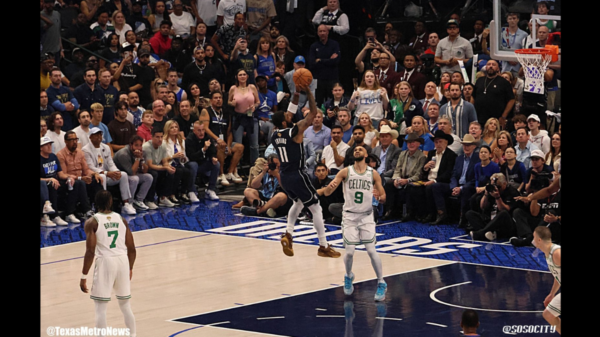 Kyrie Irving Shoots Above Celtics' Derrick White